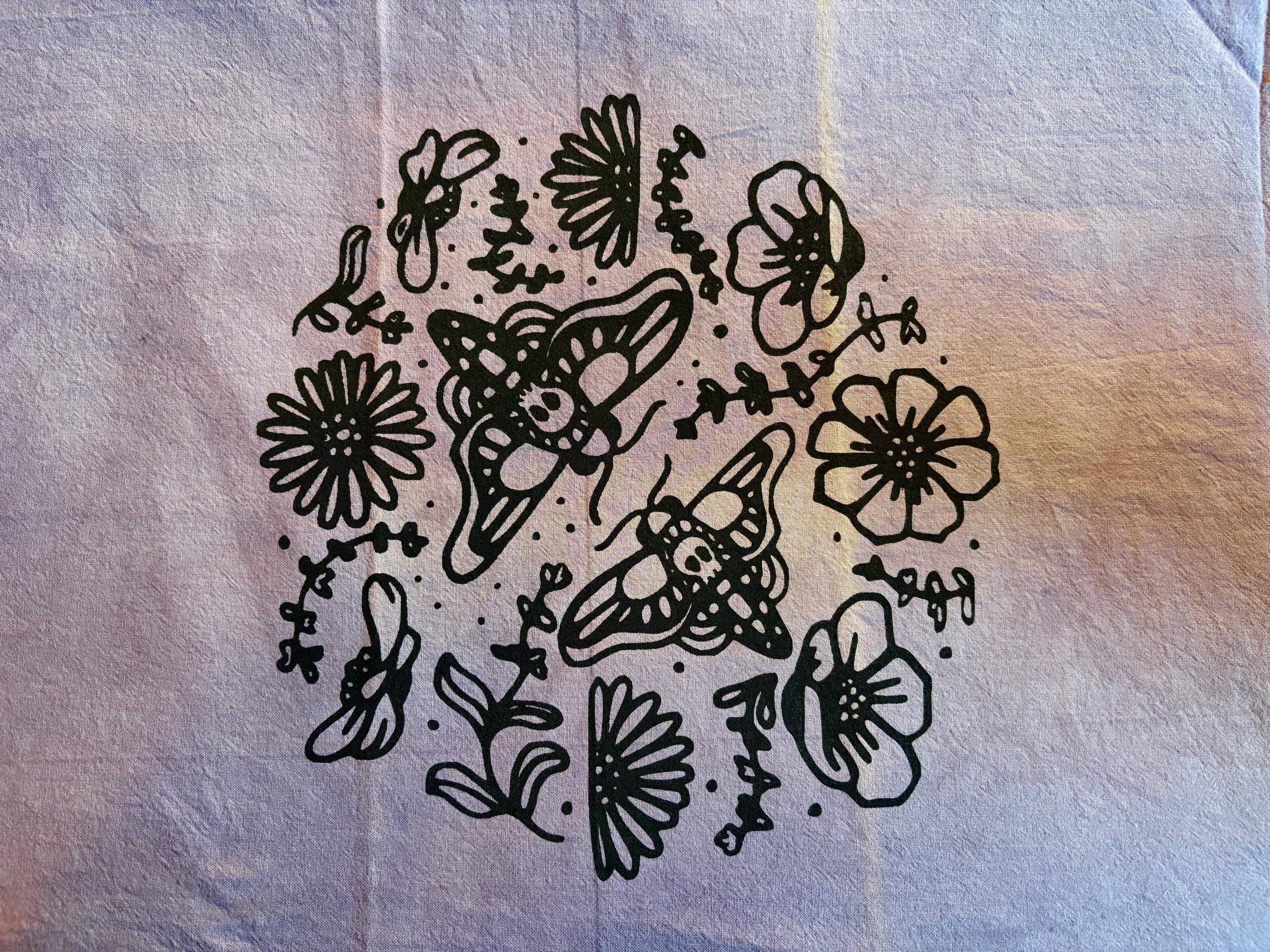 Moon Garden Tea Towel, dyed purple with Marigolds and sythetic dye.