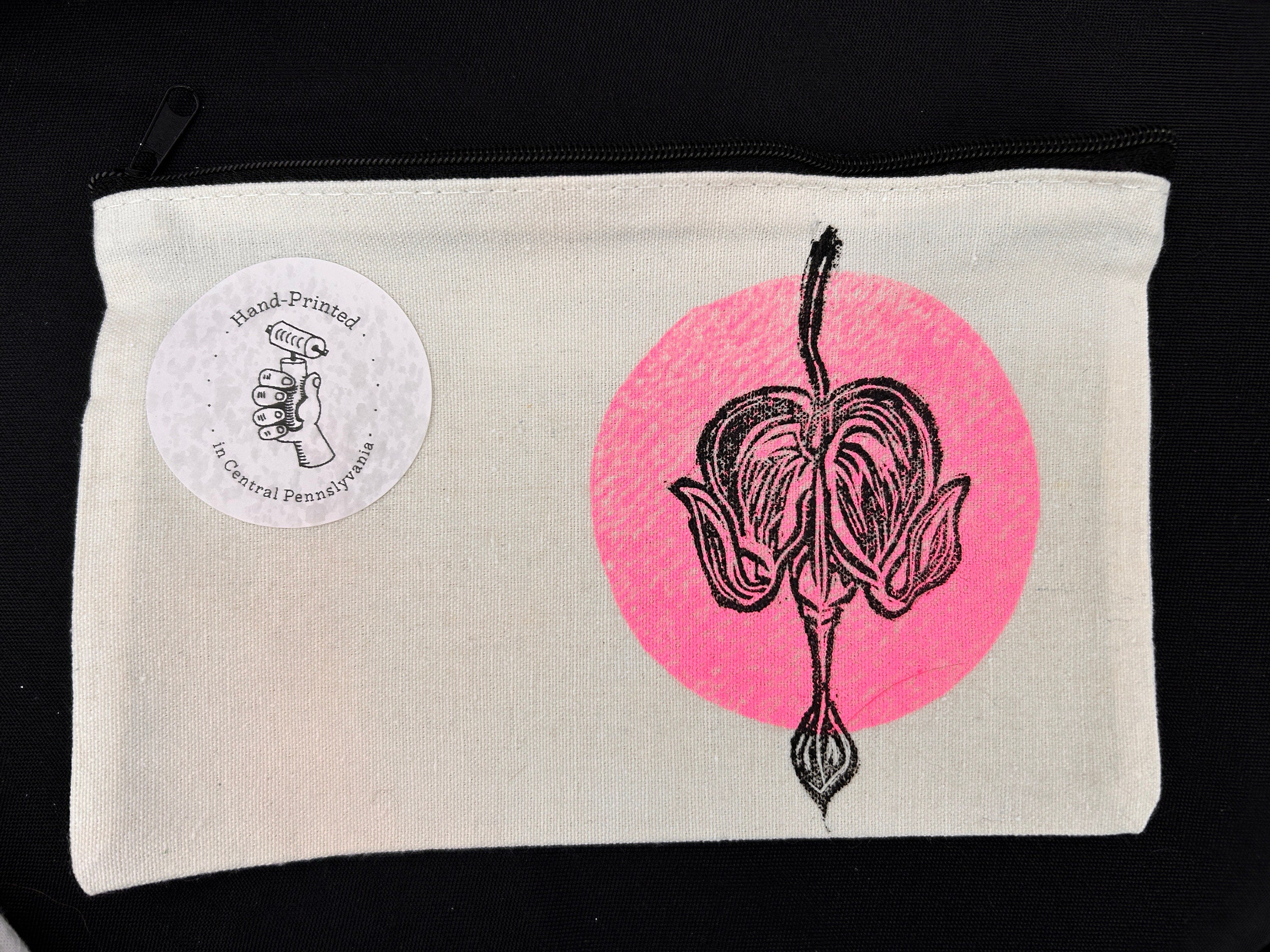 Bleeding Heart Zip Pouches